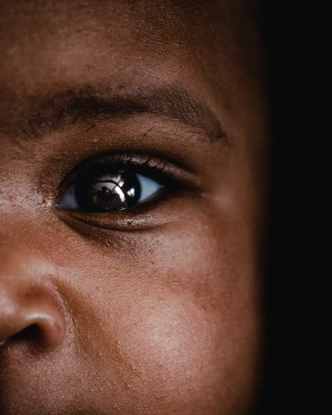 Close portrait of a young child looking ahead